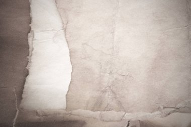 Eski kağıt çarşaf. Toz ve kirli lekelerle dolu boş bir arka plan. Eski ve antika sanat konsepti. Ayrıntılı yakın çekim stüdyo çekimi. Ön manzara. Ayarlanmış