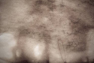 Eski kağıt çarşaf. Toz ve kirli lekelerle dolu boş bir arka plan. Eski ve antika sanat konsepti. Ayrıntılı yakın çekim stüdyo çekimi. Ön manzara. Ayarlanmış