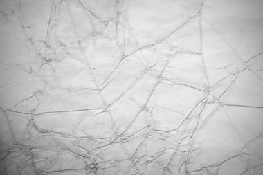 Eski kağıt çarşaf. Toz ve kirli lekelerle dolu boş bir arka plan. Eski ve antika sanat konsepti. Ayrıntılı yakın çekim stüdyo çekimi. Ön manzara. Ayarlanmış