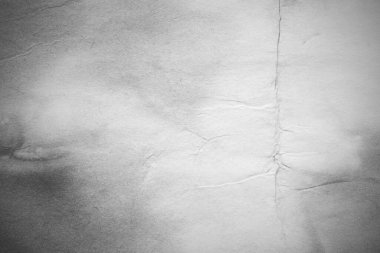 Eski kağıt çarşaf. Toz ve kirli lekelerle dolu boş bir arka plan. Eski ve antika sanat konsepti. Ayrıntılı yakın çekim stüdyo çekimi. Ön manzara. Ayarlanmış