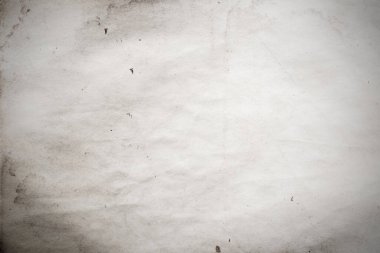 Eski kağıt çarşaf. Toz ve kirli lekelerle dolu boş bir arka plan. Eski ve antika sanat konsepti. Ayrıntılı yakın çekim stüdyo çekimi. Ön manzara. Ayarlanmış