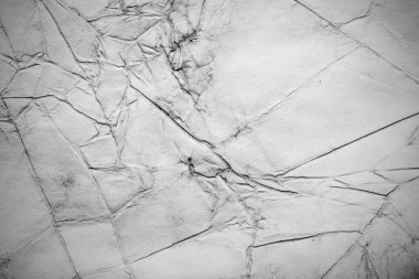 Eski kağıt çarşaf. Toz ve kirli lekelerle dolu boş bir arka plan. Eski ve antika sanat konsepti. Ayrıntılı yakın çekim stüdyo çekimi. Ön manzara. Ayarlanmış