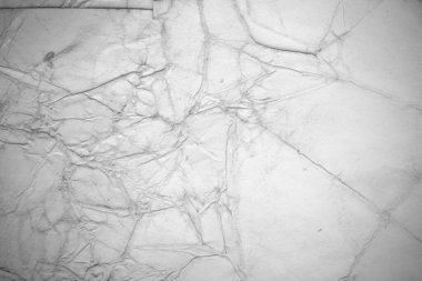 Eski kağıt çarşaf. Toz ve kirli lekelerle dolu boş bir arka plan. Eski ve antika sanat konsepti. Ayrıntılı yakın çekim stüdyo çekimi. Ön manzara. Ayarlanmış