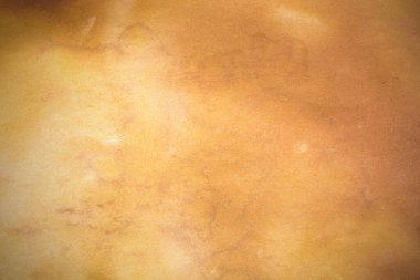 Eski kağıt çarşaf. Toz ve kirli lekelerle dolu boş bir arka plan. Eski ve antika sanat konsepti. Ayrıntılı yakın çekim stüdyo çekimi. Ön manzara. Ayarlanmış