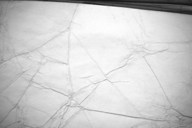 Eski kağıt çarşaf. Toz ve kirli lekelerle dolu boş bir arka plan. Eski ve antika sanat konsepti. Ayrıntılı yakın çekim stüdyo çekimi. Ön manzara. Ayarlanmış