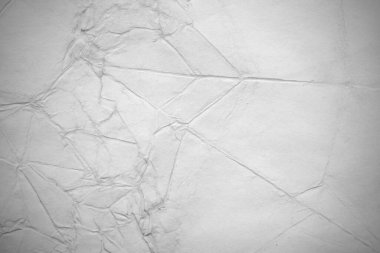 Eski kağıt çarşaf. Toz ve kirli lekelerle dolu boş bir arka plan. Eski ve antika sanat konsepti. Ayrıntılı yakın çekim stüdyo çekimi. Ön manzara. Ayarlanmış