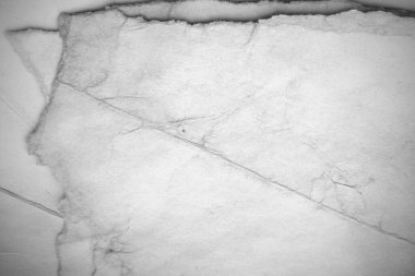 Eski kağıt çarşaf. Toz ve kirli lekelerle dolu boş bir arka plan. Eski ve antika sanat konsepti. Ayrıntılı yakın çekim stüdyo çekimi. Ön manzara. Ayarlanmış