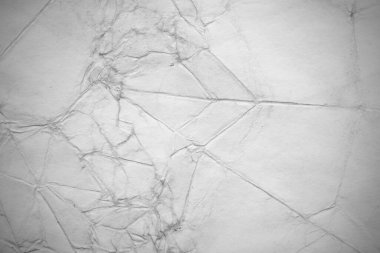 Eski kağıt çarşaf. Toz ve kirli lekelerle dolu boş bir arka plan. Eski ve antika sanat konsepti. Ayrıntılı yakın çekim stüdyo çekimi. Ön manzara. Ayarlanmış