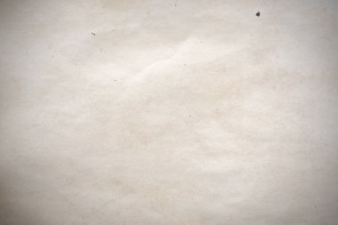 Eski kağıt çarşaf. Toz ve kirli lekelerle dolu boş bir arka plan. Eski ve antika sanat konsepti. Ayrıntılı yakın çekim stüdyo çekimi. Ön manzara. Ayarlanmış