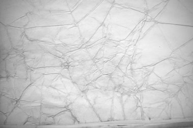 Eski kağıt çarşaf. Toz ve kirli lekelerle dolu boş bir arka plan. Eski ve antika sanat konsepti. Ayrıntılı yakın çekim stüdyo çekimi. Ön manzara. Ayarlanmış