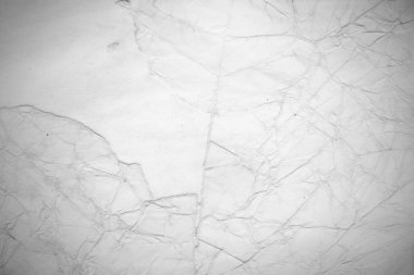 Eski kağıt çarşaf. Toz ve kirli lekelerle dolu boş bir arka plan. Eski ve antika sanat konsepti. Ayrıntılı yakın çekim stüdyo çekimi. Ön manzara. Ayarlanmış