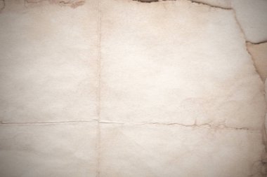 Eski kağıt çarşaf. Toz ve kirli lekelerle dolu boş bir arka plan. Eski ve antika sanat konsepti. Ayrıntılı yakın çekim stüdyo çekimi. Ön manzara. Ayarlanmış