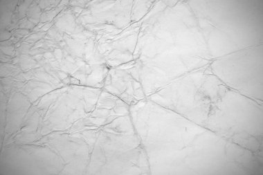 Eski kağıt çarşaf. Toz ve kirli lekelerle dolu boş bir arka plan. Eski ve antika sanat konsepti. Ayrıntılı yakın çekim stüdyo çekimi. Ön manzara. Ayarlanmış