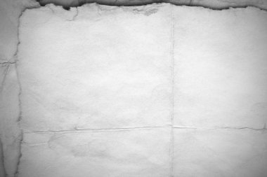 Eski kağıt çarşaf. Toz ve kirli lekelerle dolu boş bir arka plan. Eski ve antika sanat konsepti. Ayrıntılı yakın çekim stüdyo çekimi. Ön manzara. Ayarlanmış