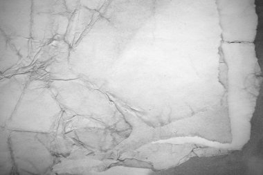 Eski kağıt çarşaf. Toz ve kirli lekelerle dolu boş bir arka plan. Eski ve antika sanat konsepti. Ayrıntılı yakın çekim stüdyo çekimi. Ön manzara. Ayarlanmış