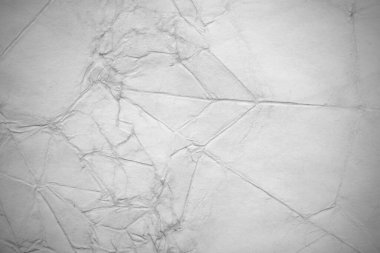 Eski kağıt çarşaf. Toz ve kirli lekelerle dolu boş bir arka plan. Eski ve antika sanat konsepti. Ayrıntılı yakın çekim stüdyo çekimi. Ön manzara. Ayarlanmış