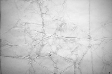 Eski kağıt çarşaf. Toz ve kirli lekelerle dolu boş bir arka plan. Eski ve antika sanat konsepti. Ayrıntılı yakın çekim stüdyo çekimi. Ön manzara. Ayarlanmış