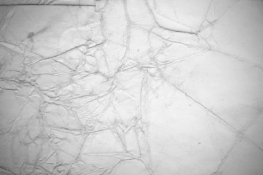 Eski kağıt çarşaf. Toz ve kirli lekelerle dolu boş bir arka plan. Eski ve antika sanat konsepti. Ayrıntılı yakın çekim stüdyo çekimi. Ön manzara. Ayarlanmış