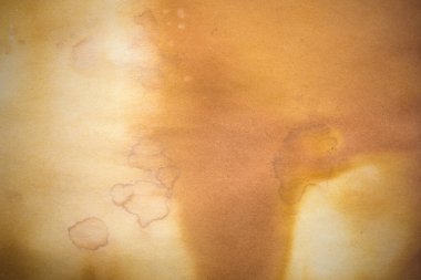 Eski kağıt çarşaf. Toz ve kirli lekelerle dolu boş bir arka plan. Eski ve antika sanat konsepti. Ayrıntılı yakın çekim stüdyo çekimi. Ön manzara. Ayarlanmış