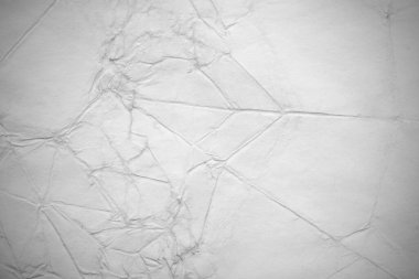 Eski kağıt çarşaf. Toz ve kirli lekelerle dolu boş bir arka plan. Eski ve antika sanat konsepti. Ayrıntılı yakın çekim stüdyo çekimi. Ön manzara. Ayarlanmış