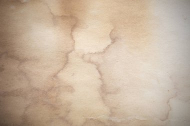 Eski kağıt çarşaf. Toz ve kirli lekelerle dolu boş bir arka plan. Eski ve antika sanat konsepti. Ayrıntılı yakın çekim stüdyo çekimi. Ön manzara. Ayarlanmış