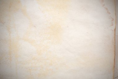 Eski kağıt çarşaf. Toz ve kirli lekelerle dolu boş bir arka plan. Eski ve antika sanat konsepti. Ayrıntılı yakın çekim stüdyo çekimi. Ön manzara. Ayarlanmış