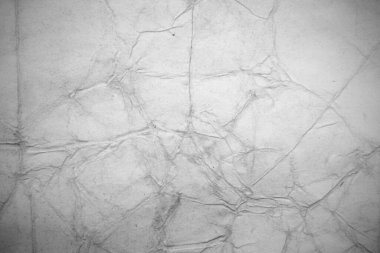 Eski kağıt çarşaf. Toz ve kirli lekelerle dolu boş bir arka plan. Eski ve antika sanat konsepti. Ayrıntılı yakın çekim stüdyo çekimi. Ön manzara. Ayarlanmış