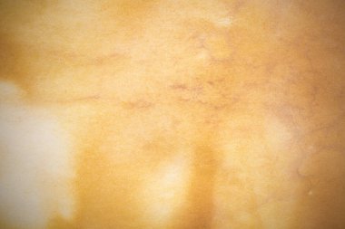 Eski kağıt çarşaf. Toz ve kirli lekelerle dolu boş bir arka plan. Eski ve antika sanat konsepti. Ayrıntılı yakın çekim stüdyo çekimi. Ön manzara. Ayarlanmış