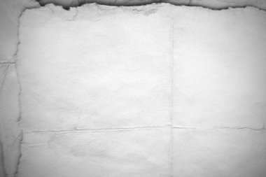 Eski kağıt çarşaf. Toz ve kirli lekelerle dolu boş bir arka plan. Eski ve antika sanat konsepti. Ayrıntılı yakın çekim stüdyo çekimi. Ön manzara. Ayarlanmış