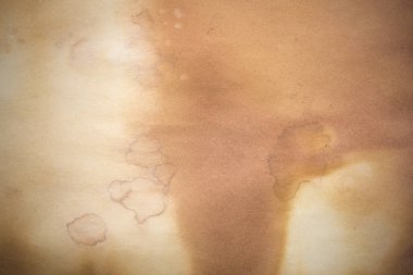 Eski kağıt çarşaf. Toz ve kirli lekelerle dolu boş bir arka plan. Eski ve antika sanat konsepti. Ayrıntılı yakın çekim stüdyo çekimi. Ön manzara. Ayarlanmış