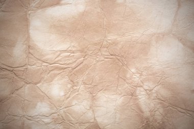 Eski kağıt çarşaf. Toz ve kirli lekelerle dolu boş bir arka plan. Eski ve antika sanat konsepti. Ayrıntılı yakın çekim stüdyo çekimi. Ön manzara. Ayarlanmış