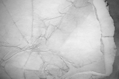 Eski kağıt çarşaf. Toz ve kirli lekelerle dolu boş bir arka plan. Eski ve antika sanat konsepti. Ayrıntılı yakın çekim stüdyo çekimi. Ön manzara. Ayarlanmış