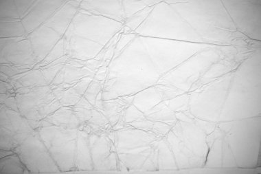 Eski kağıt çarşaf. Toz ve kirli lekelerle dolu boş bir arka plan. Eski ve antika sanat konsepti. Ayrıntılı yakın çekim stüdyo çekimi. Ön manzara. Ayarlanmış