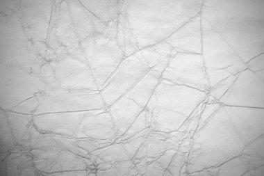 Eski kağıt çarşaf. Toz ve kirli lekelerle dolu boş bir arka plan. Eski ve antika sanat konsepti. Ayrıntılı yakın çekim stüdyo çekimi. Ön manzara. Ayarlanmış