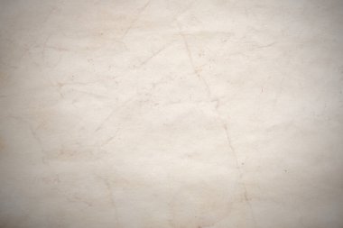 Eski kağıt çarşaf. Toz ve kirli lekelerle dolu boş bir arka plan. Eski ve antika sanat konsepti. Ayrıntılı yakın çekim stüdyo çekimi. Ön manzara. Ayarlanmış