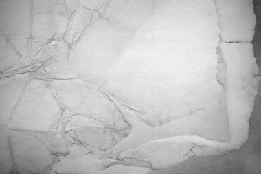 Eski kağıt çarşaf. Toz ve kirli lekelerle dolu boş bir arka plan. Eski ve antika sanat konsepti. Ayrıntılı yakın çekim stüdyo çekimi. Ön manzara. Ayarlanmış