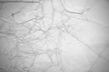 Eski kağıt çarşaf. Toz ve kirli lekelerle dolu boş bir arka plan. Eski ve antika sanat konsepti. Ayrıntılı yakın çekim stüdyo çekimi. Ön manzara. Ayarlanmış