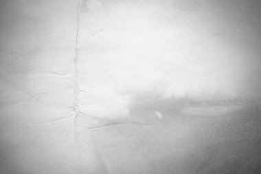 Eski kağıt çarşaf. Toz ve kirli lekelerle dolu boş bir arka plan. Eski ve antika sanat konsepti. Ayrıntılı yakın çekim stüdyo çekimi. Ön manzara. Ayarlanmış