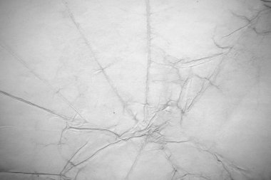 Eski kağıt çarşaf. Toz ve kirli lekelerle dolu boş bir arka plan. Eski ve antika sanat konsepti. Ayrıntılı yakın çekim stüdyo çekimi. Ön manzara. Ayarlanmış