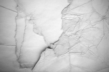 Eski kağıt çarşaf. Toz ve kirli lekelerle dolu boş bir arka plan. Eski ve antika sanat konsepti. Ayrıntılı yakın çekim stüdyo çekimi. Ön manzara. Ayarlanmış