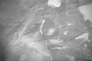 Eski kağıt çarşaf. Toz ve kirli lekelerle dolu boş bir arka plan. Eski ve antika sanat konsepti. Ayrıntılı yakın çekim stüdyo çekimi. Ön manzara. Ayarlanmış