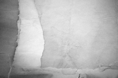 Eski kağıt çarşaf. Toz ve kirli lekelerle dolu boş bir arka plan. Eski ve antika sanat konsepti. Ayrıntılı yakın çekim stüdyo çekimi. Ön manzara. Ayarlanmış