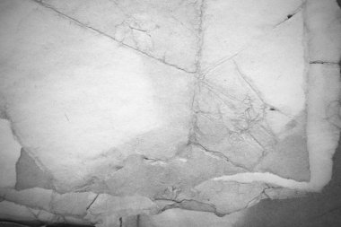 Eski kağıt çarşaf. Toz ve kirli lekelerle dolu boş bir arka plan. Eski ve antika sanat konsepti. Ayrıntılı yakın çekim stüdyo çekimi. Ön manzara. Ayarlanmış