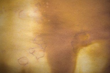 Aged paper sheet. Blank old background with dust and dirty stains. Vintage and antique art concept. Poster mockup. Detailed closeup studio shot. Front view. Toned