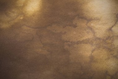 Aged paper sheet. Blank old background with dust and dirty stains. Vintage and antique art concept. Poster mockup. Detailed closeup studio shot. Front view. Toned