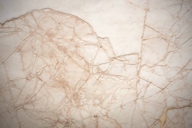 Aged paper sheet. Blank old background with dust and dirty stains. Vintage and antique art concept. Poster mockup. Detailed closeup studio shot. Front view. Toned