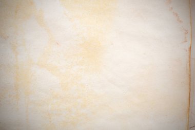 Aged paper sheet. Blank old background with dust and dirty stains. Vintage and antique art concept. Poster mockup. Detailed closeup studio shot. Front view. Toned