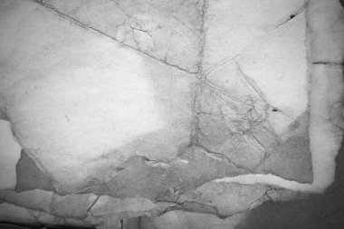 Eski kağıt çarşaf. Toz ve kirli lekelerle dolu boş bir arka plan. Eski ve antika sanat konsepti. Ayrıntılı yakın çekim stüdyo çekimi. Ön manzara. Ayarlanmış