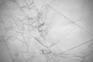 Eski kağıt çarşaf. Toz ve kirli lekelerle dolu boş bir arka plan. Eski ve antika sanat konsepti. Ayrıntılı yakın çekim stüdyo çekimi. Ön manzara. Ayarlanmış