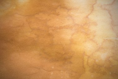 Aged paper sheet. Blank old background with dust and dirty stains. Vintage and antique art concept. Poster mockup. Detailed closeup studio shot. Front view. Toned